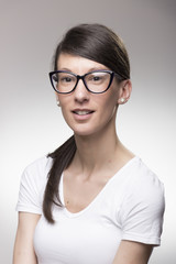 Fototapeta premium Portrait of pretty girl wearing eyeglasses