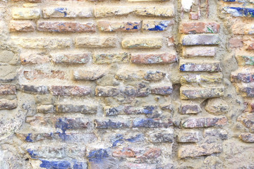 Damaged brick wall