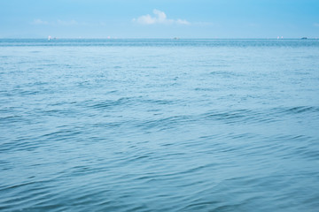 Blue sea calm wave. Motion blur