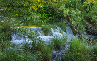 Threshold on the creek in the park Krka.