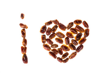 Dry dates in form of heart.