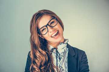 Portrait closeup of funny business woman smiling with glasses