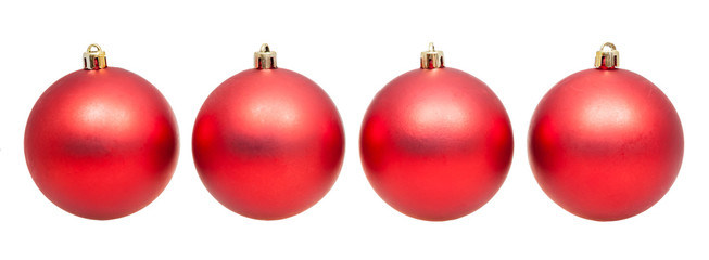 four red xmas balls isolated on white background