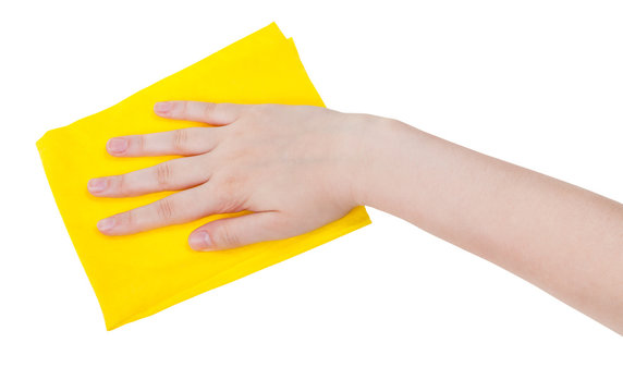 hand with yellow cleaning rag isolated on white
