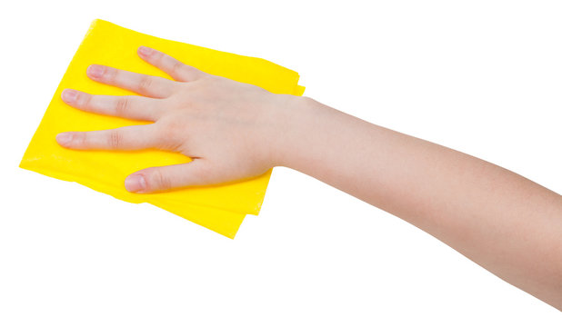 hand with yellow dusting rag isolated on white