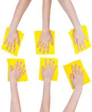 set of hands with yellow fabric rags isolated
