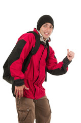 young man wearing red winter coat hitchhiking
