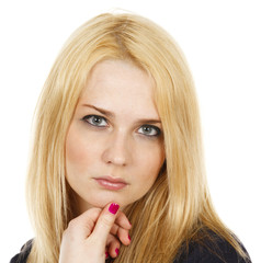 Portrait of an attractive young woman looking at the viewer.