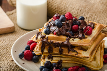 Waffles with fruits and chocolate