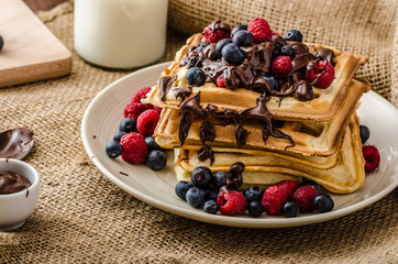 Waffles with fruits and chocolate
