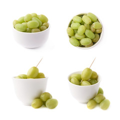 White grapes in a ceramic bowl isolated