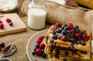 Waffles with fruits and chocolate