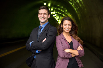 Legal team portrait confident interesting background tunnel street city urban environment