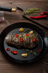 Beef steak with herbs and chilli, product photo