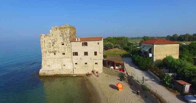 Ancient Tower along the beach. Aerial view