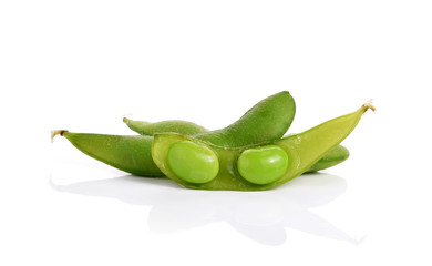 green soybeans on white background