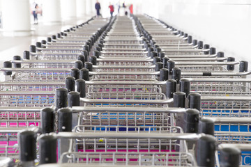 Obraz premium trolleys luggage in a row in airport