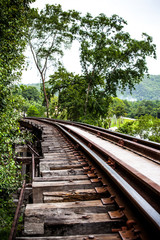 Fototapeta na wymiar Railroad tracks on a dangerous path