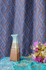 Moroccan style vase and flowers.