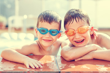 Boys laughing in pool