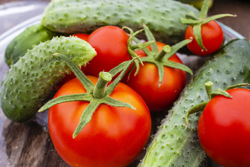cucumbers and tomatoes for salting