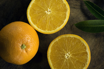 half orange on wood table