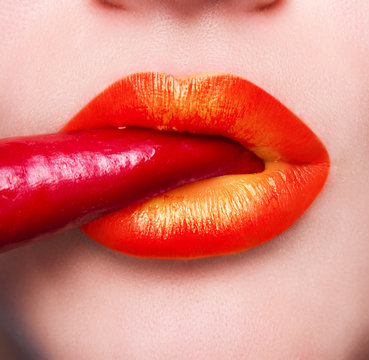 
    Halloween makeup. Expression rock style lip make-up like a vampire, dark romantic. Fashion look, glitter, multicolor, soft focus 