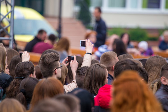 Crowd filming favorite band exhibition during concert. Lutsk. Ukraine.