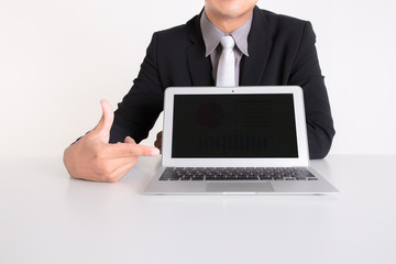 Business man with a laptop. isolated over a white background