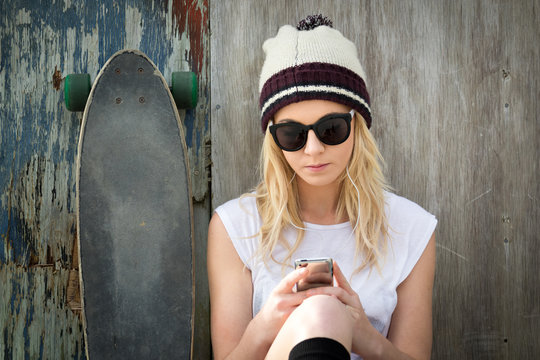 Blond Skater Girl Text Messaging