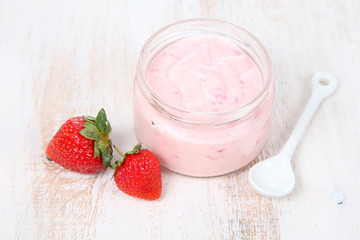 Strawberry yogurt and ripe strawberry