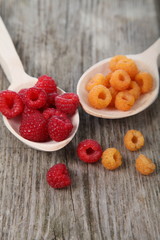 Ripe yellow and red raspberries