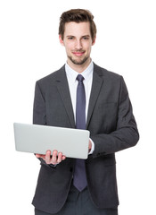 Young Businessman use of the notebook computer