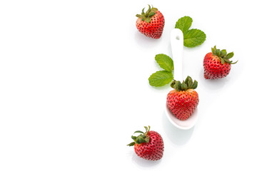 fresh strawberry in white spoon, healthy, natural, mint