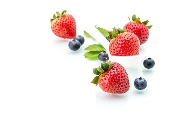 Obraz na płótnie Canvas fresh strawberry in white spoon, healthy, natural, mint, Blueber