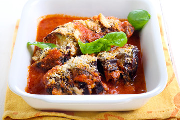 Roast aubergine parmigiana in baking tin