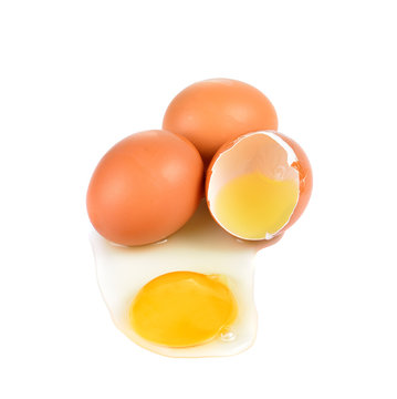 Raw broken egg on white background