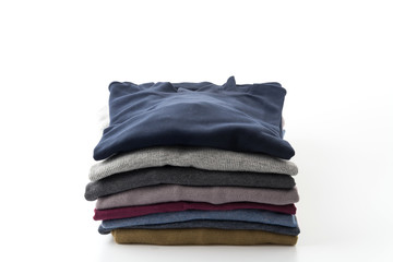 Stack of clothes isolated on white background
