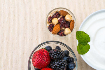 healthy breakfast with yogurt, berry and nuts, dieting