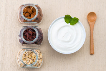 Fototapeta na wymiar healthy breakfast with yogurt and nuts, dieting, granola