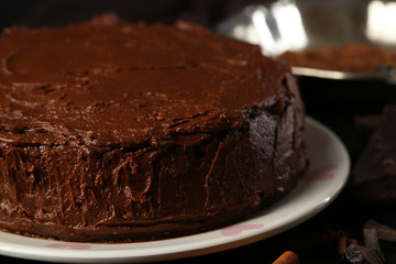 Chocolate cake on table, close-up