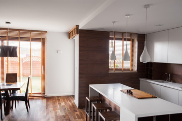 Bright kitchen with dinning room