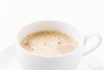 a cup of coffee on white