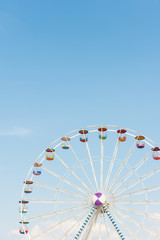 colourful ferris wheel with blue sky