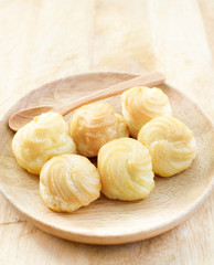 Choux Cream, Cream puff on wooden table