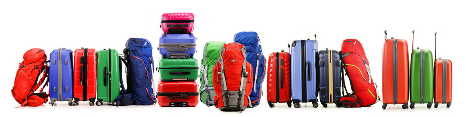 Suitcases and backpacks isolated on white background