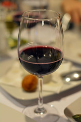 Celebration with a glass of red wine