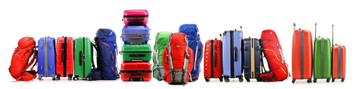 Suitcases and backpacks isolated on white background