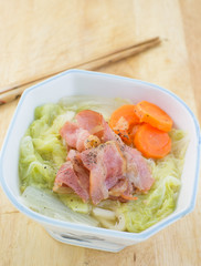 noodle soup with smoke bacon ,lettuce and carrot