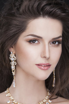 portrait of a beautiful brunette sexy girl with luxury